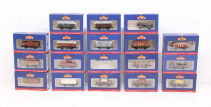 Bachmann: A collection of eighteen assorted boxed Bachmann, OO Gauge rolling stock. General wear