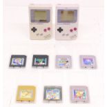 Game Boy: A pair of original Nintendo, Game Boy handheld consoles, Reference DMG-001. Together