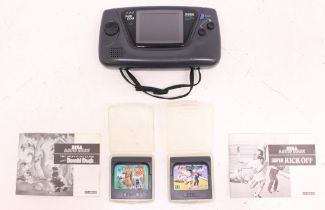 Sega: A Sega Game Gear Portable Game Console, together with Super Kick Off and The Lucky Dime