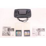 Sega: A Sega Game Gear Portable Game Console, together with Super Kick Off and The Lucky Dime