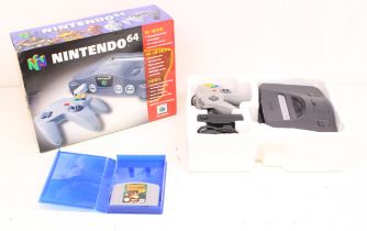 Nintendo: A boxed Nintendo 64 console, with Rumble Pak, official controller and power supply;