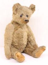 Steiff: An early 20th century, mohair teddy bear, believed to be Steiff, circa 1910. Button eyes,