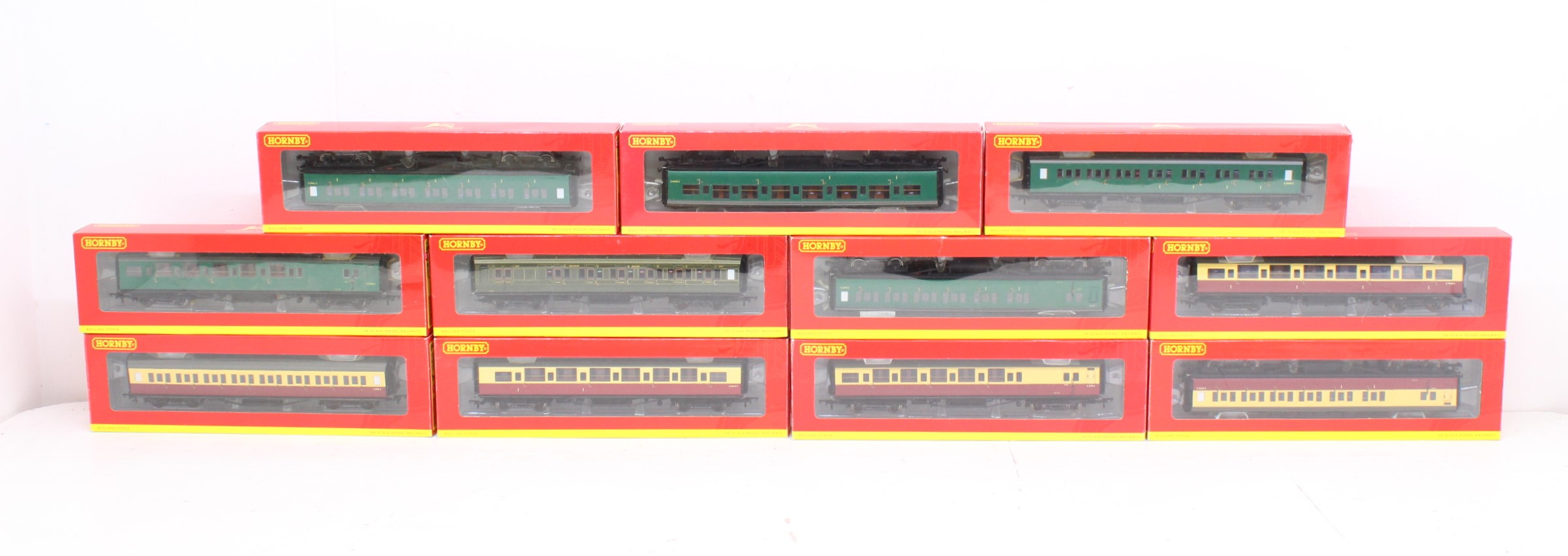 Hornby: A collection of eleven boxed Hornby, OO Gauge coaches to comprise: R4303C, R4304C, R4304E,