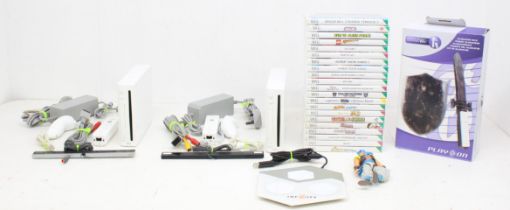 Nintendo: A pair of unboxed Nintendo Wii consoles, with controller and cables; and a collection of