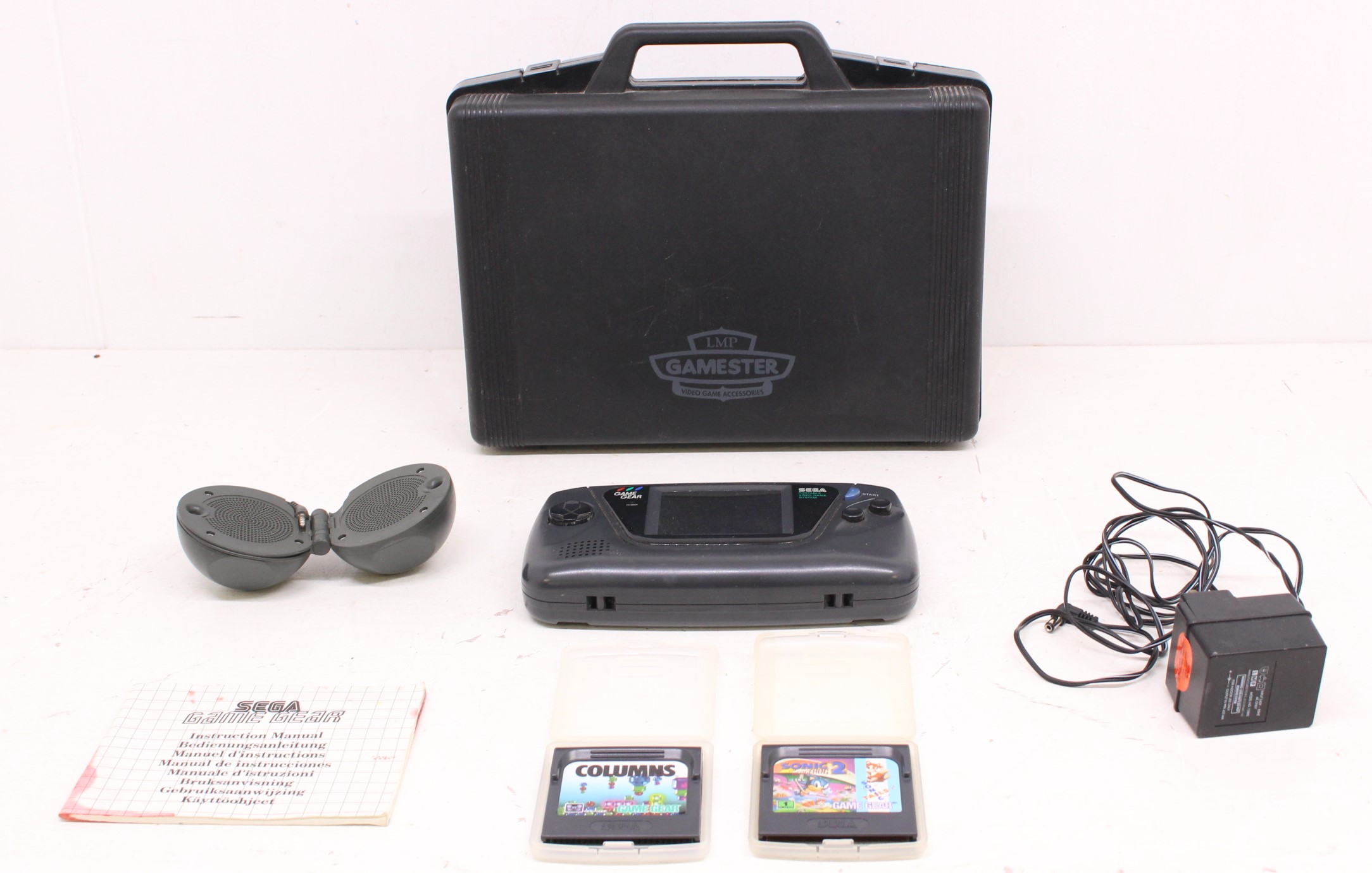 Sega: A Sega Game Gear Portable Game Console, together with Columns and Sonic the Hedgehog 2 game