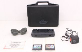 Sega: A Sega Game Gear Portable Game Console, together with Columns and Sonic the Hedgehog 2 game