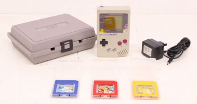 Game Boy: An original Nintendo, Game Boy handheld console, Reference DMG-01. With Pokemon screen,