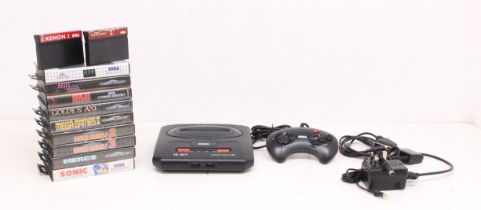 Sega: An unboxed Sega Mega Drive II console, with one Sega controller and power supply; and a