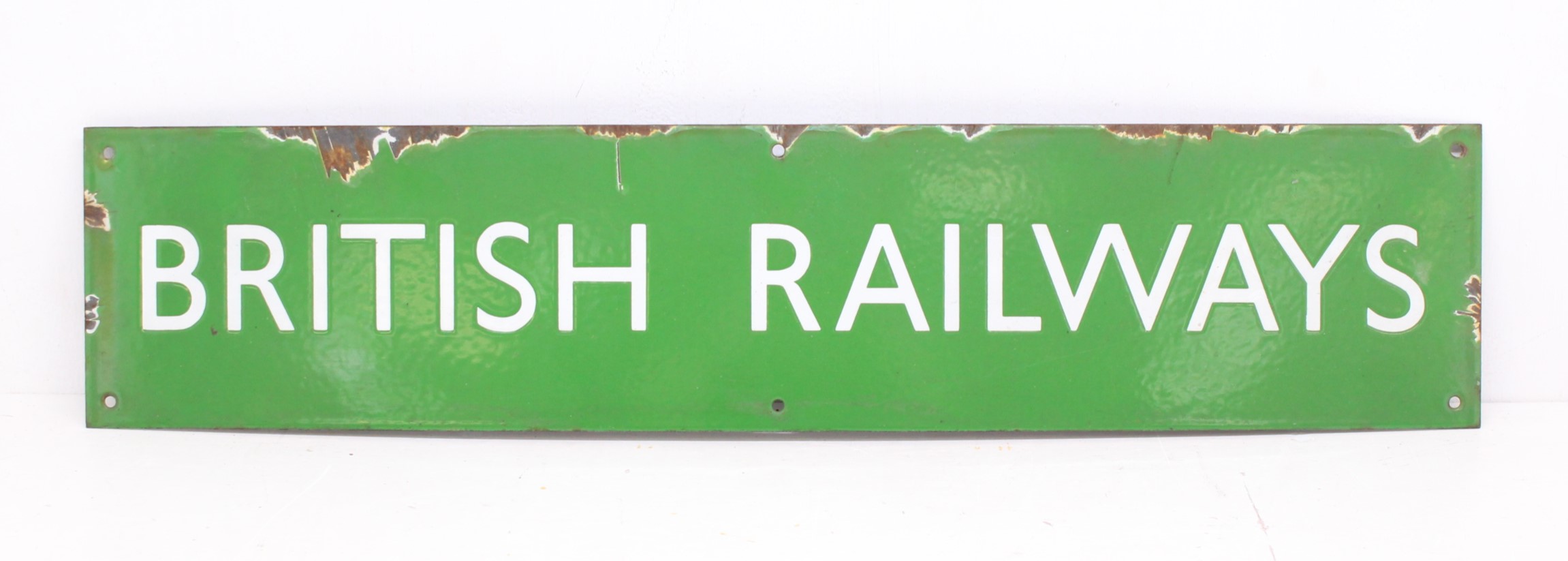 Railwayana: An early 20th century, green enamel 'British Railways' sign. Enamel has sustained some