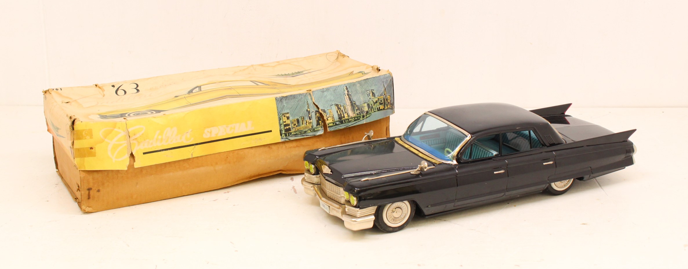 Bandai: A boxed Bandai, Cadillac '63 Special Sedan, Friction Driven, within original box. Contents - Image 2 of 5