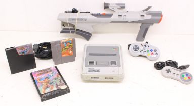 Nintendo: An unboxed Super Nintendo Entertainment System (SNES) console, with one official