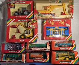 Britains: A collection of assorted Britains Farm vehicles and implements to include: Massey Ferguson