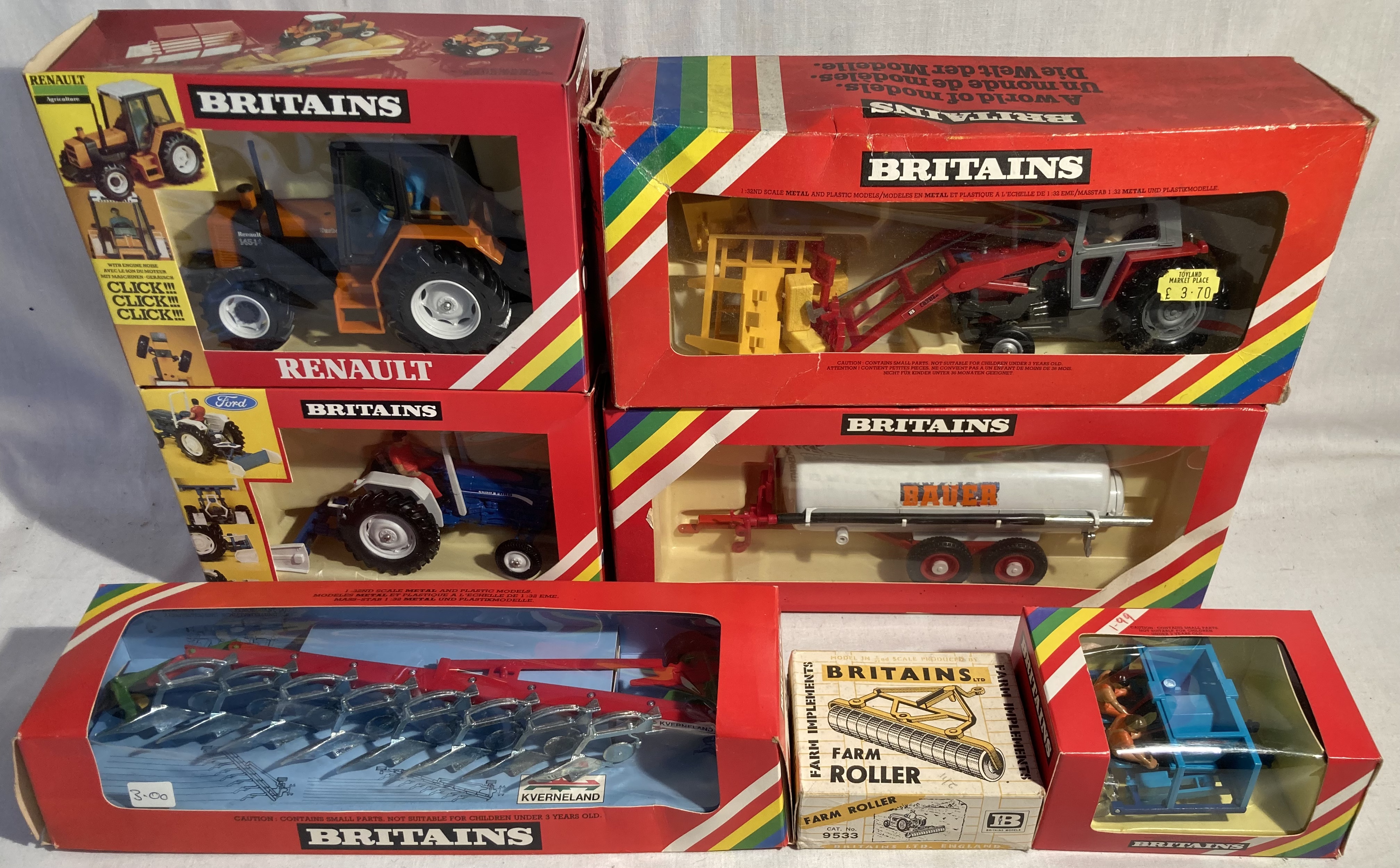 Britains: A collection of assorted Britains farm tractors and implements to include: rare 9516