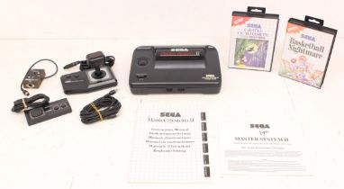 Sega: An unboxed Sega Master System II console, with controller, control stick and instruction