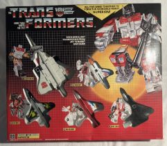 Transformers: A boxed Transformers, Aerialbot Air Warrior Superion, comprising five items: