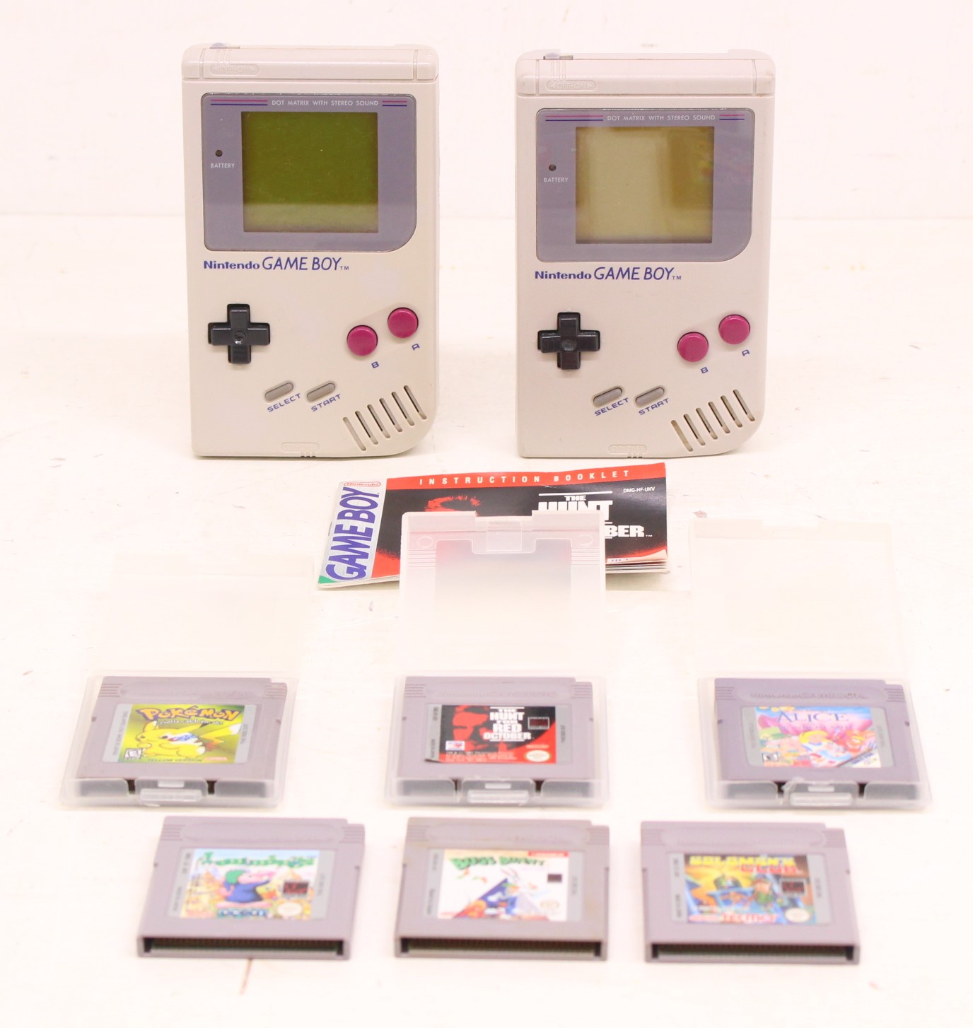 Game Boy: A pair of original Nintendo, Game Boy handheld consoles, Reference DMG-001. Together