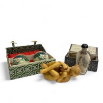 3 items to include  - Japanese carved wood figurine of a nude lady, 8cm Long.   - 2 painted glass