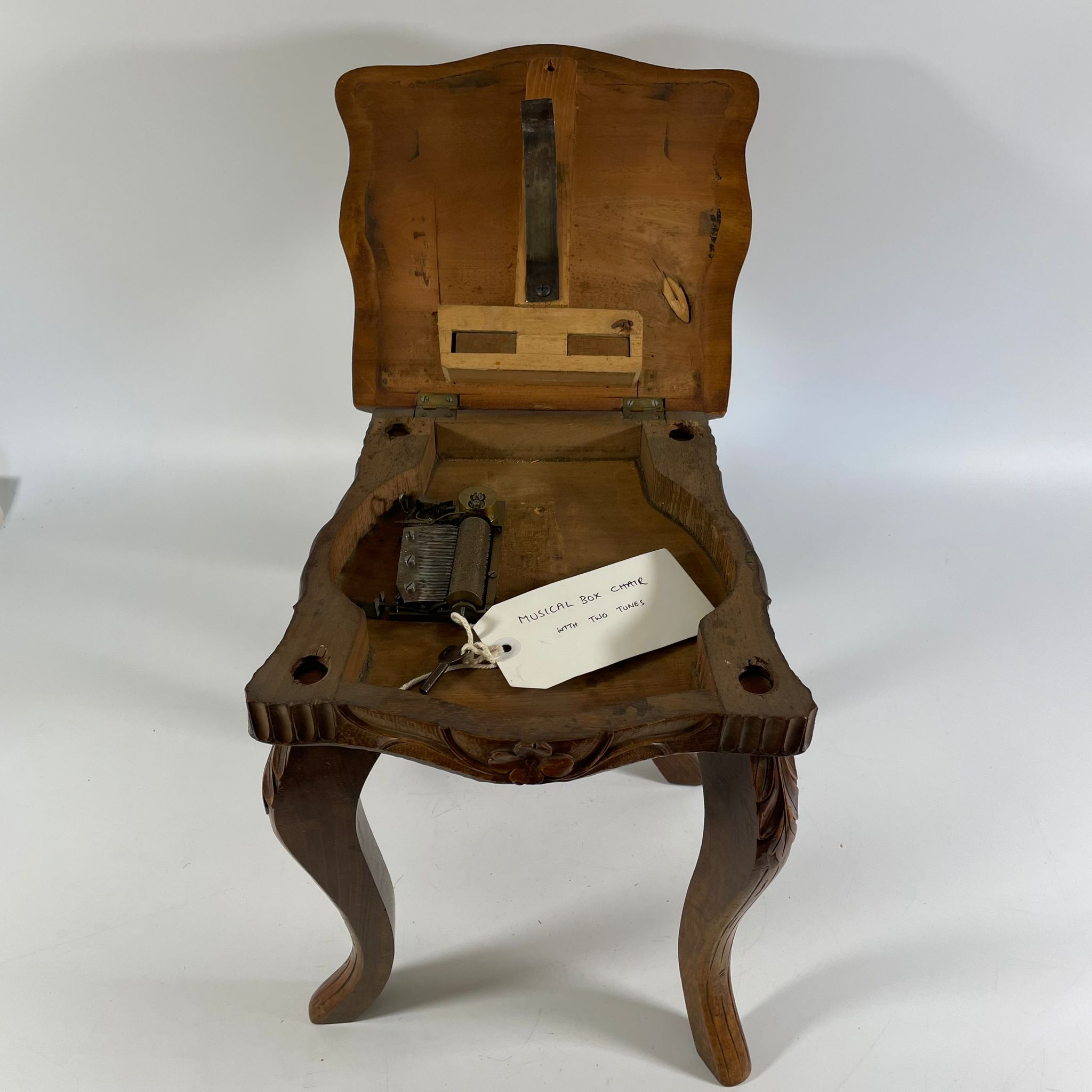 ***AWAY*** A late Victorian/Edwardian Bavarian/Black Forest carved walnut child's musical chair - Image 3 of 3