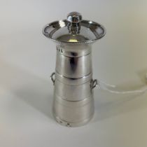 A Victorian sterling silver butter churn shaped pepper grinder. Approximate height 9.2cm. Hallmarked