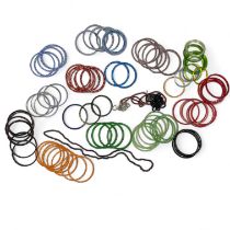 A large collection of 1930's Indian Glass Bangles / Bracelets in various colours. Mixed sizes but