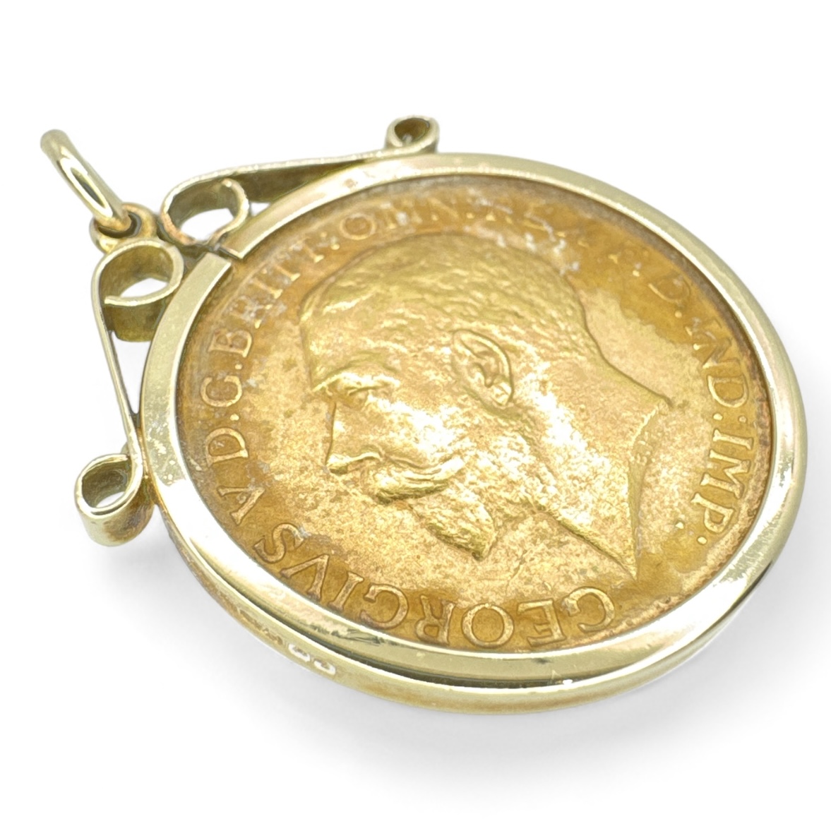 A George V full gold 1912 sovereign in a 9ct yellow gold clip mount. Gross approximate weight 9.7 - Image 2 of 2