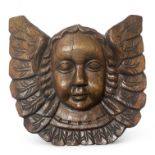 A Carved oak Angel Face 28cm x 7cm x 26cm