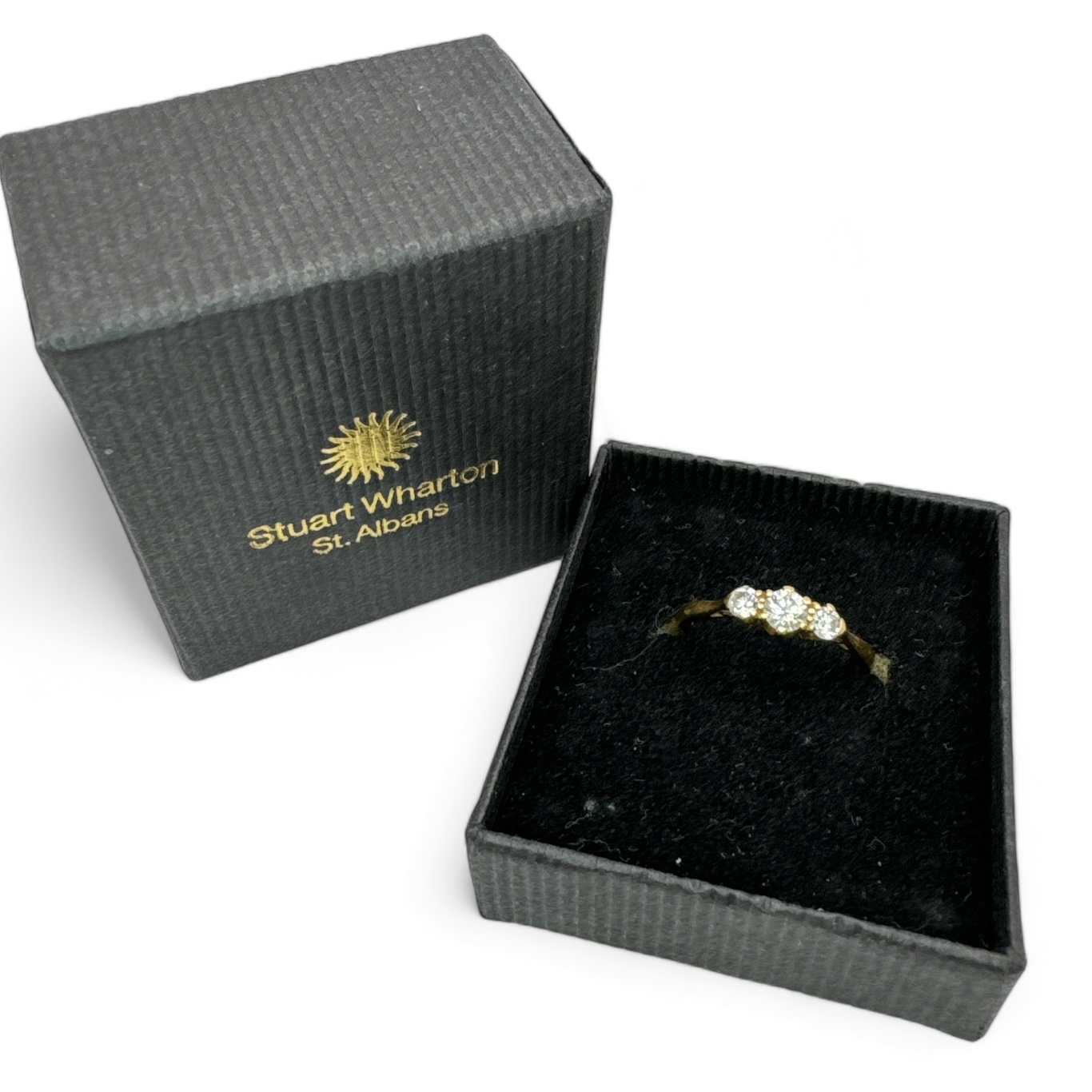 An estimated 0.40ct 18ct gold diamond three stone ring. Featuring a central round brilliant cut - Image 3 of 3