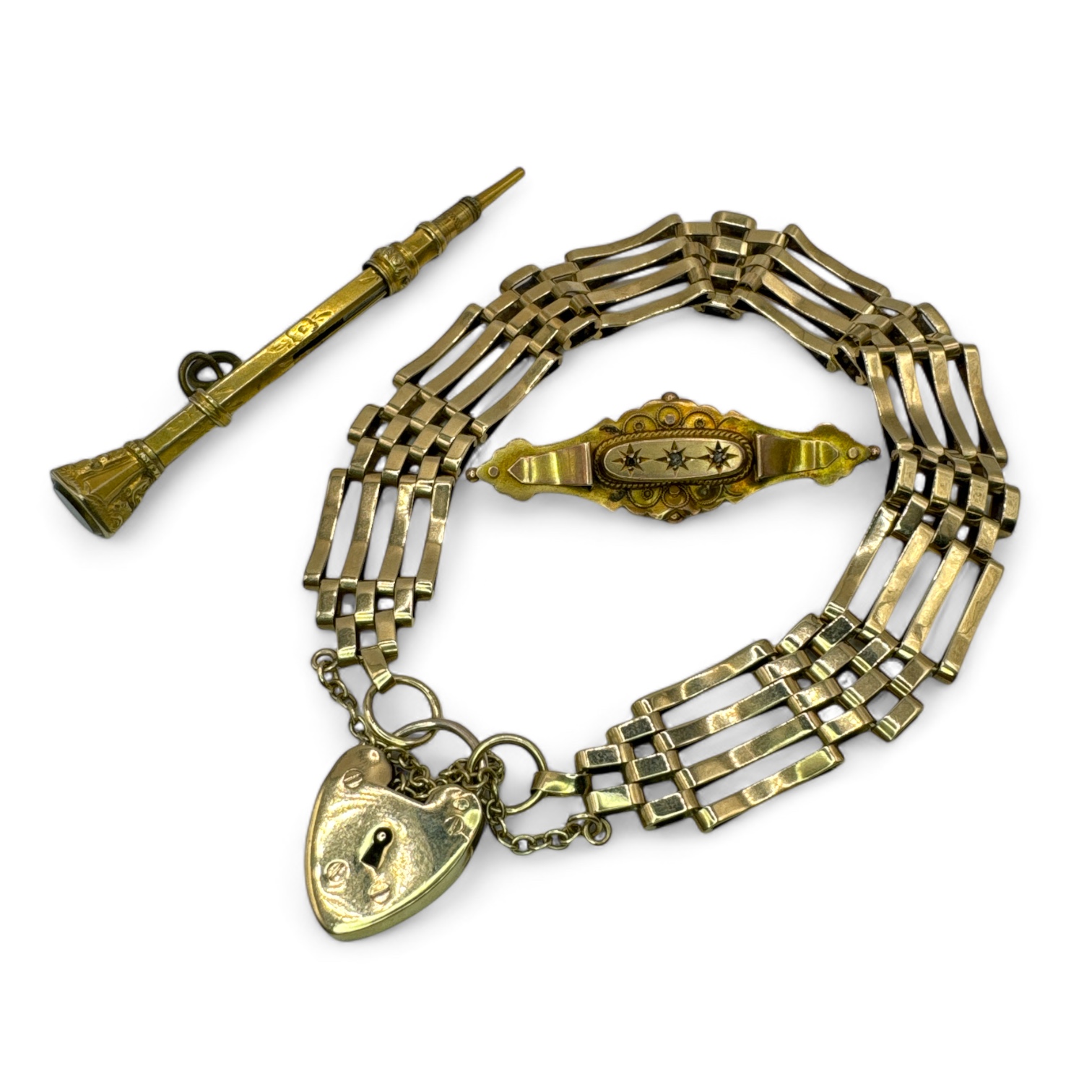 A 9ct gold gate bracelet, with heart padlock, along with a diamond set archaeological revival