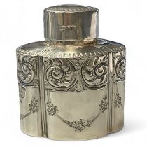 An Edward VII embossed sterling silver tea caddy, marked for the Atkin Brothers, Sheffield 1908.