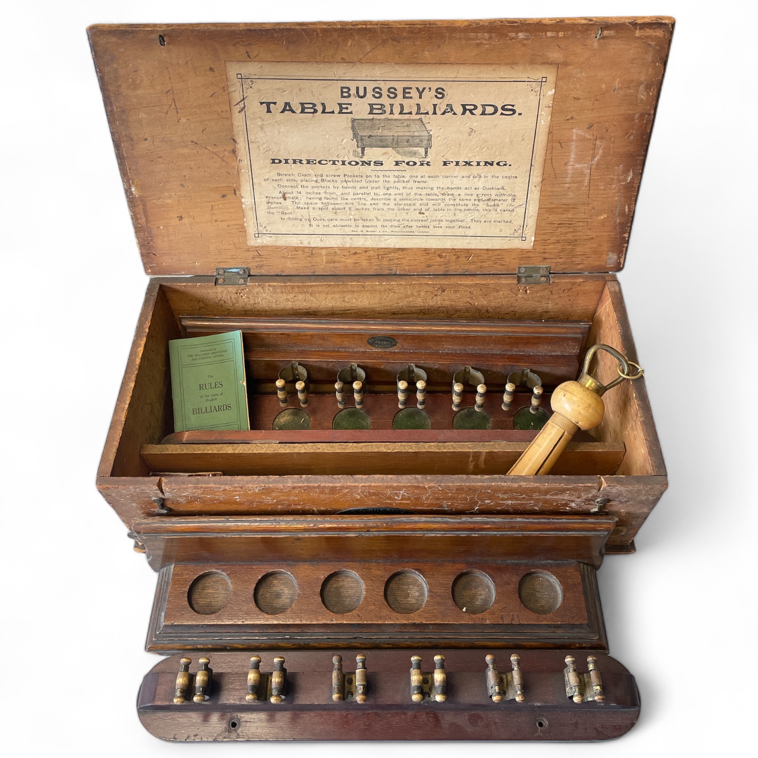 George Bussey & Co Ltd, two snooker/billiard cues wall mounted stands in a table billiards box. (one