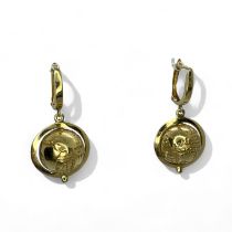 A pair of spinning globe earrings. Stamped 14k and testing as 14ct gold. Gross weight