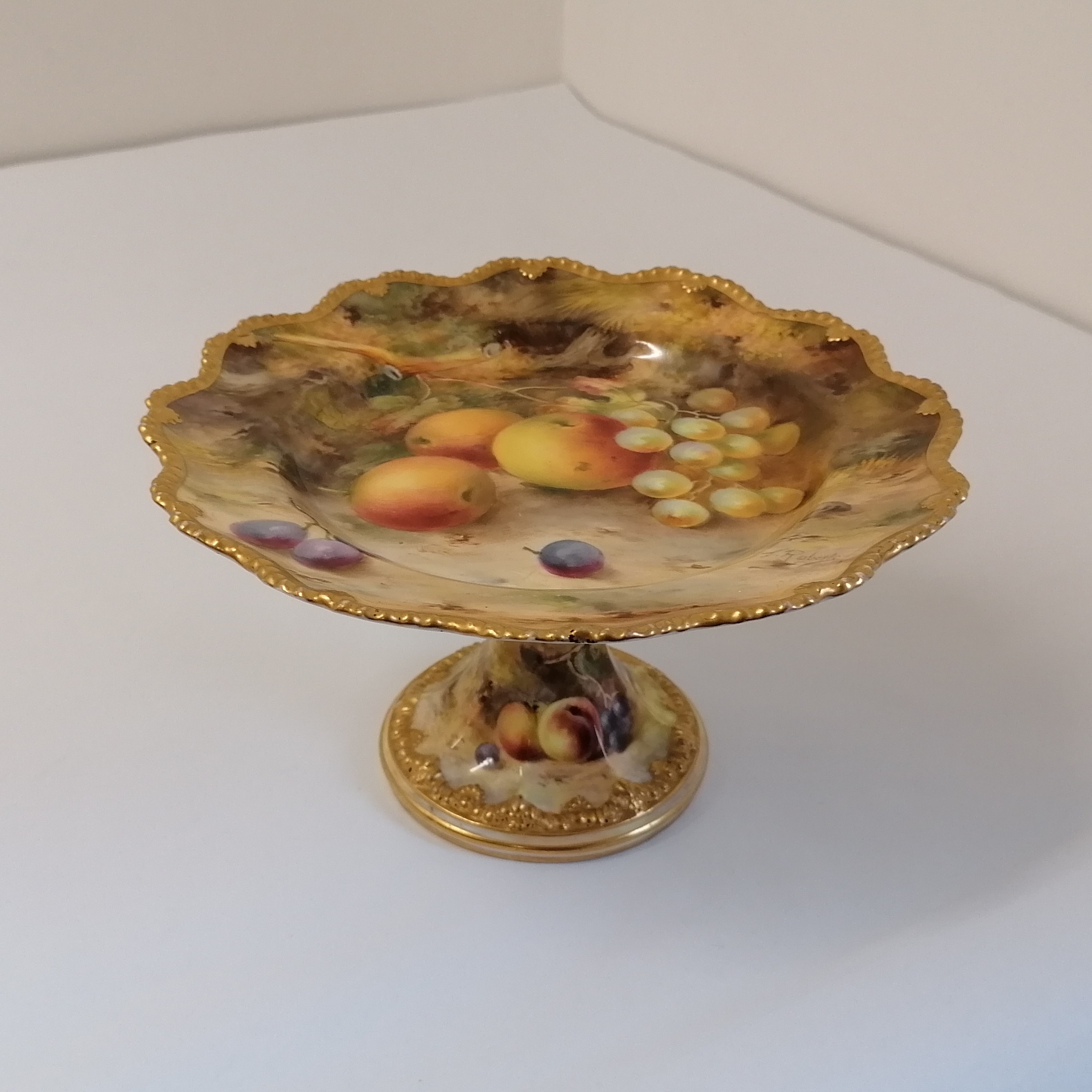 A Royal Worcester hand painted with fruit tazza. Signed by F Roberts (Frank Roberts). Puce mark.