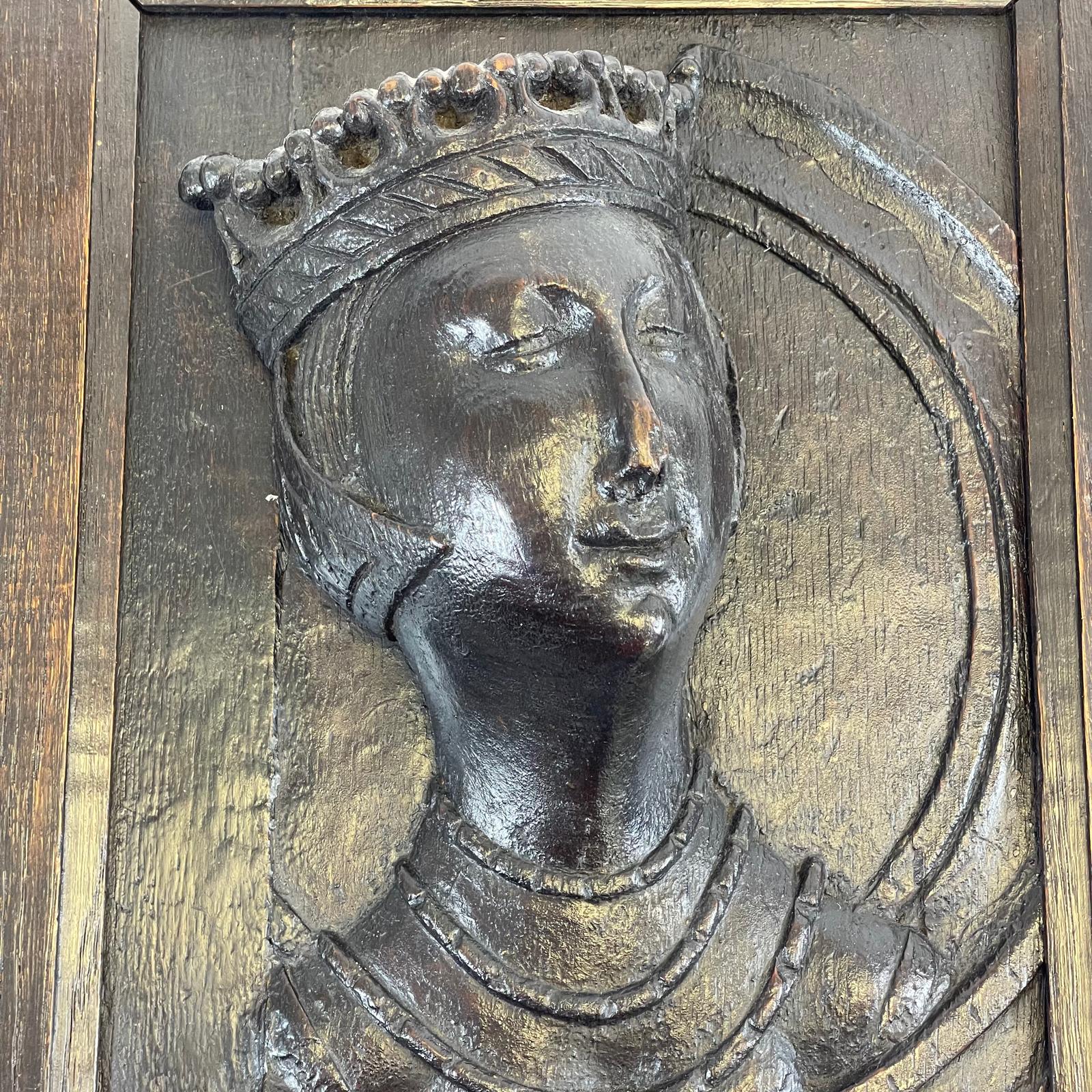 A early oak carved panel of a queens head with a replacement piece and later framed surround 28cm - Image 4 of 5