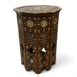 An Eastern Octagonal, side table with mother of pearl and bone inlay 39cm x 56cm Tall Some loss
