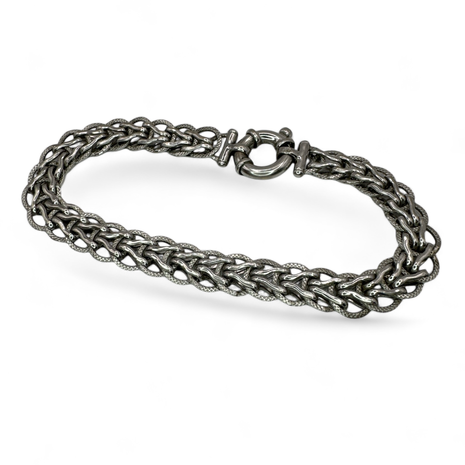 A 9ct white gold fancy link bracelet with oversized bolt clasp. Approximate length 19cm. Approximate - Image 2 of 2