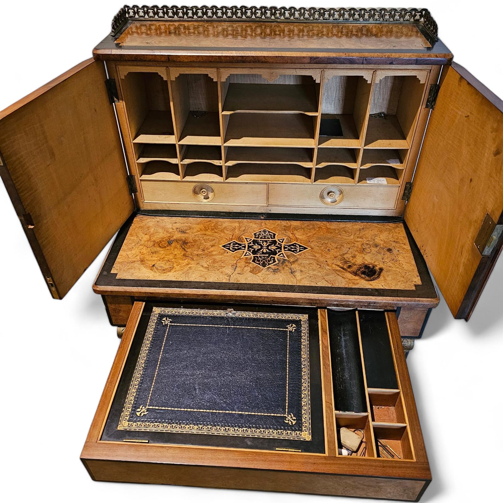 A Victorian Burr Walnut Ebonised Davenport with a fitted Upstand above a writing drawer and cupboard - Image 3 of 4