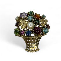 A late Arts & Crafts style giardinetti brooch set with garnets, zircon, cultured pearls, amethyst