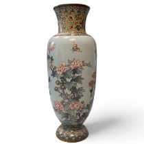 A good cloisonné enamel vase decorated with flowering prunus and insects. 13cm diameter x 40cm