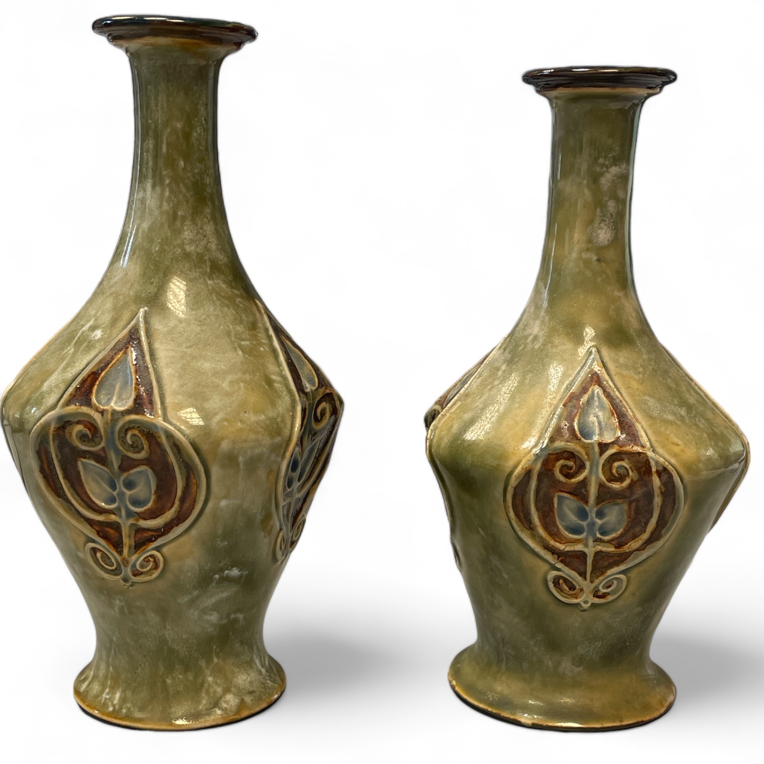 A pair of Royal Doulton art Nouveau Vases, Number 2464,9cm x 9cm x 20cm tall. Both in good