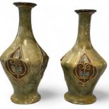 A pair of Royal Doulton art Nouveau Vases, Number 2464,9cm x 9cm x 20cm tall. Both in good