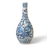 A Blue & White Oriental dragon bottle vase with four character mark to base. 9cm x 21cm tall Some