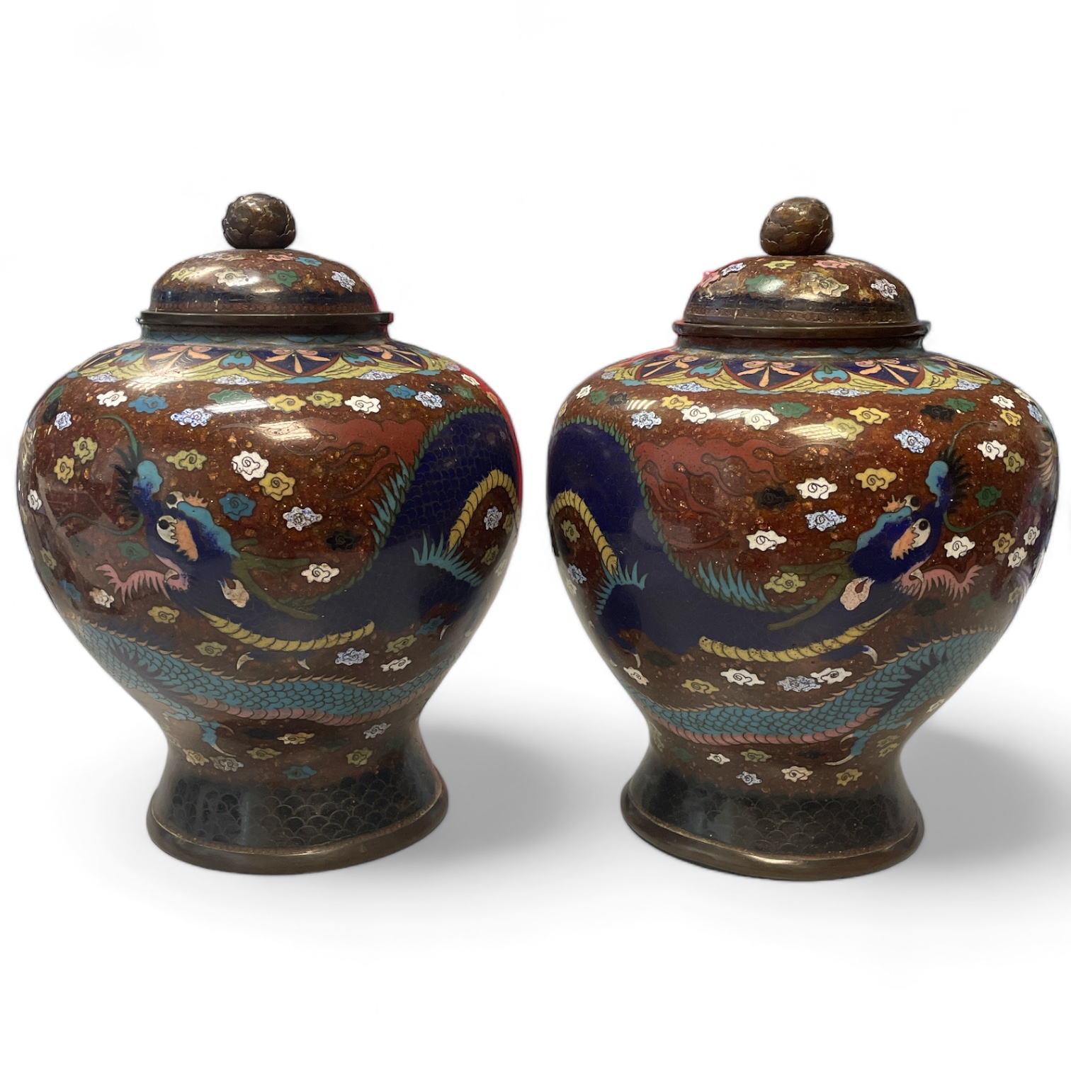 A Pair of Cloisonné enamel lidded dragon jars 17cm diameter x 23cm tall. Some damage mainly to lids