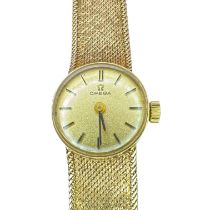 A 9ct gold ladies Omega cocktail watch with a 9ct gold bracelet. Featuring a champagne dial, with
