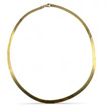 A Portuguese 800 yellow gold ribbon chain necklace. With a lobster clasp. Featuring the Porto