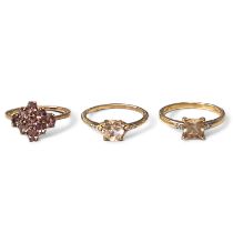 A trio of 9ct gold dress rings by Gemporia. Featuring a colour-change garnet cluster ring, size R; a