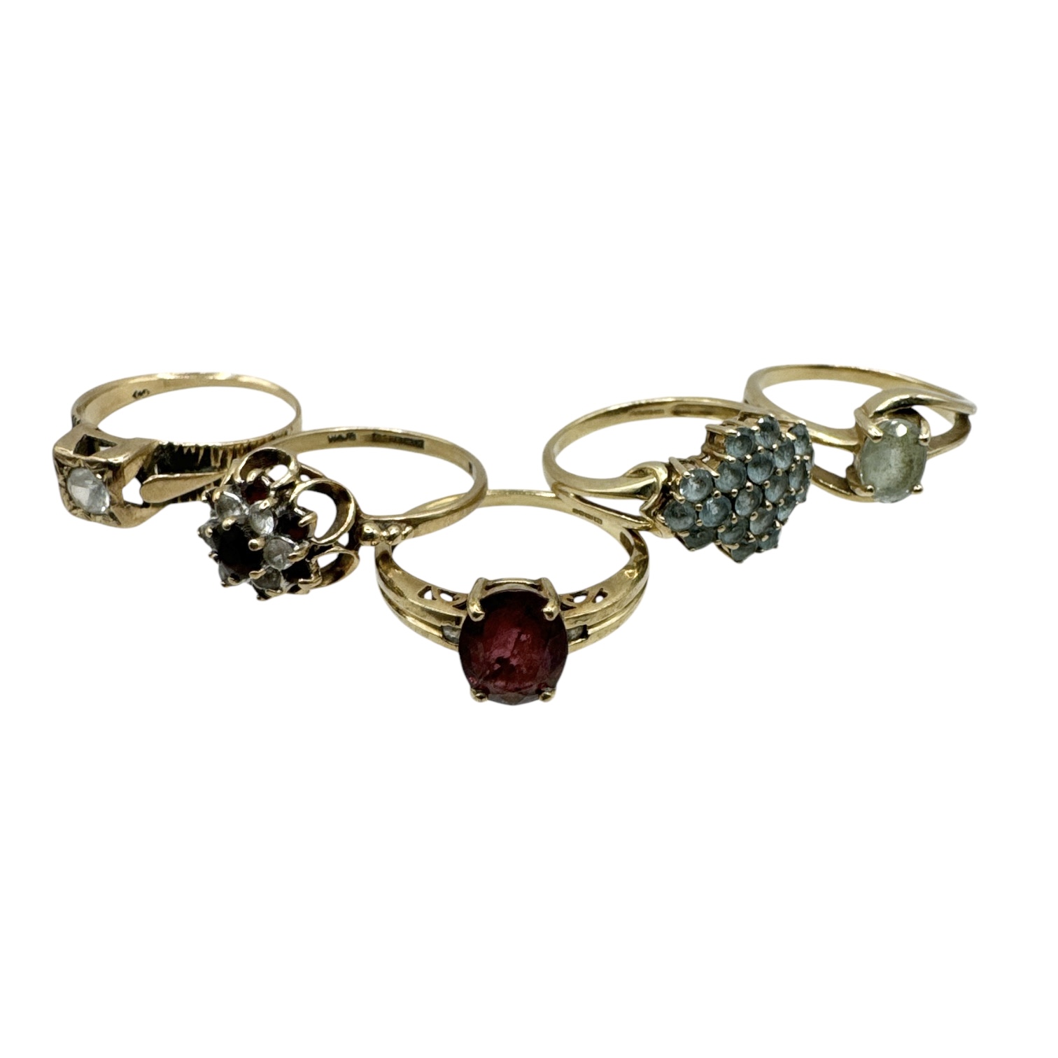 A collection of five 9ct gold gem set rings, all between sizes M-O. Gross weight approximately 12.28