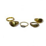 A group of five gold rings. Comprising: A 22ct band ring (approximate weight 5.00 grams); two 9ct