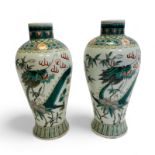 A Pair of Chinese Famille Verte Dragon Vases with four character Marks to base. 10cm diameter x 22cm