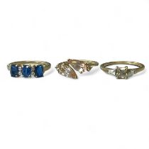 A collection of three 9ct gold gem set rings by Gemporia. Featuring a blue Kyanite and white