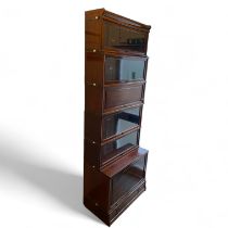 A Globe Wernicke mahogany stacking bookcase with four glazed sections, two cupboard sections and a